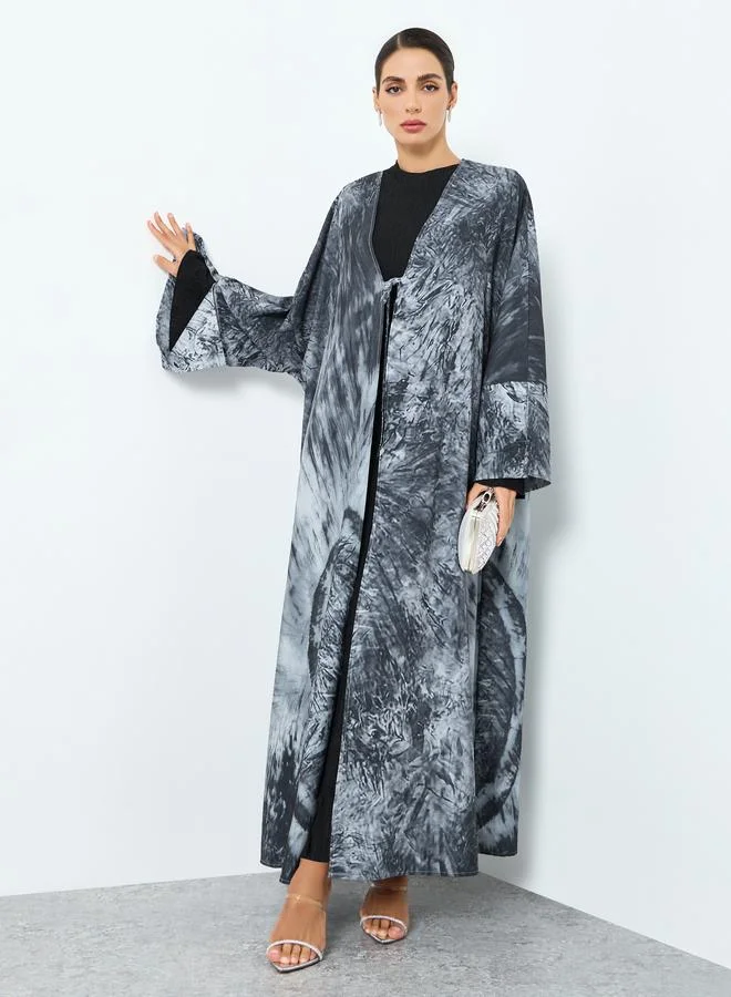 تايك تو عباية بطبعة جرافيك وأكمام طويلة